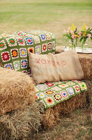 Country party theme as hay bale love seat.